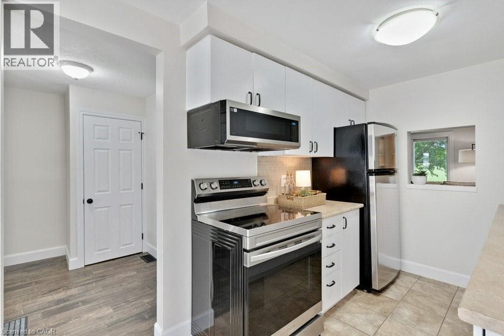 Townhouse for sale at 700 ERINBROOK Drive Unit# 22, Country Hills West, Kitchener, Ontario, photo 3