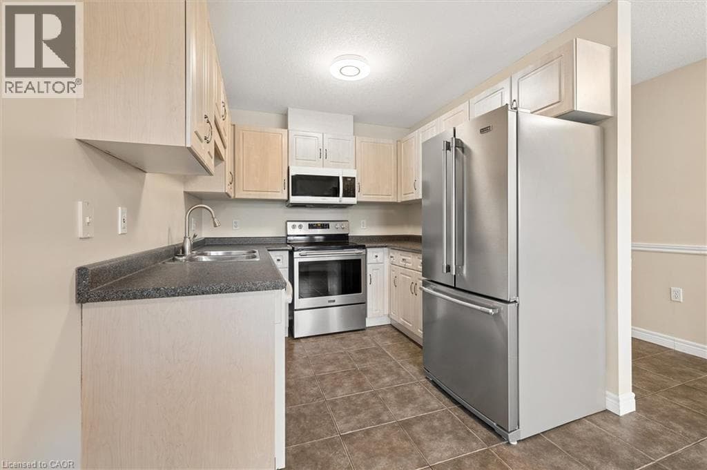 Townhouse for sale at 21 PORCHLIGHT Drive, Elmira, Woolwich, Ontario, photo 11
