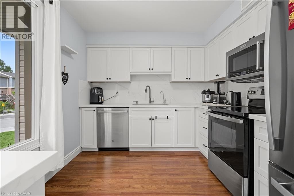Townhouse for sale at 15 GREEN VALLEY Drive Unit# 1, Pioneer Park, Kitchener, Ontario, photo 7