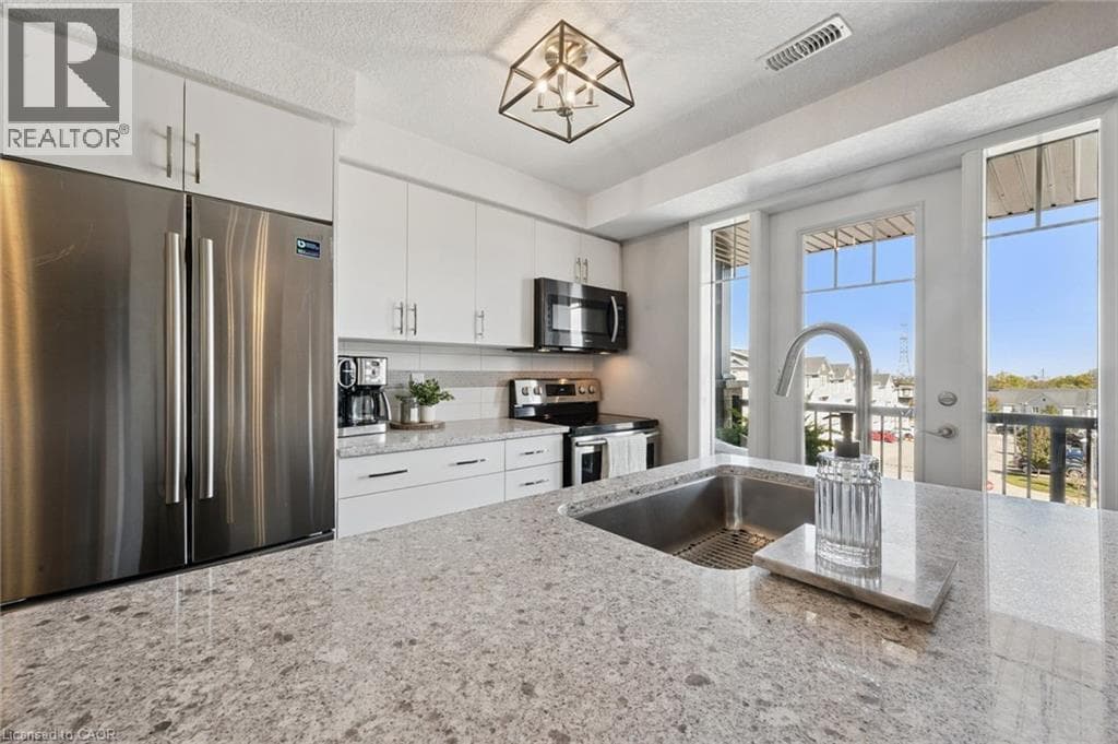 Townhouse for sale at 1989 S OTTAWA Street S Unit# 65E, Laurentian West, Kitchener, Ontario, photo 9