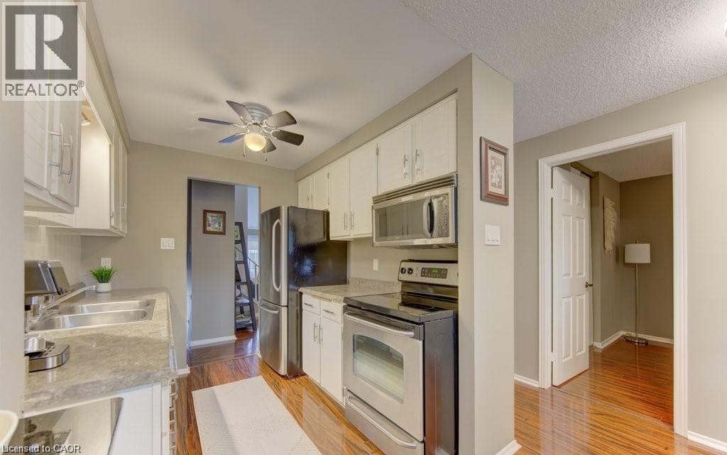 Townhouse for sale at 458 BEECHWOOD Place Unit# 3, Rummelhardt, Waterloo, Ontario, photo 3