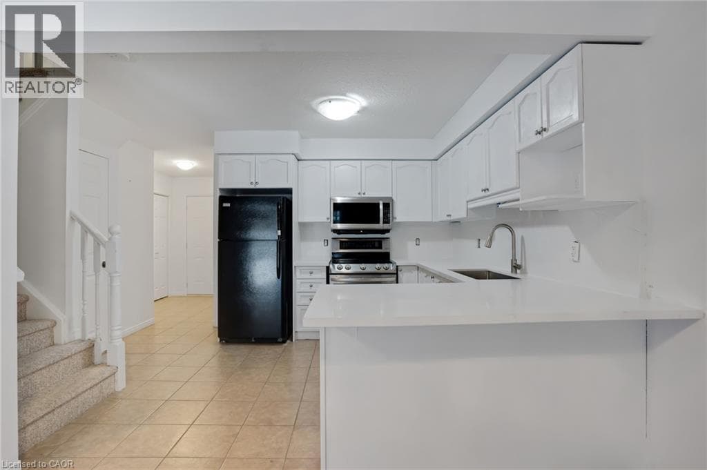 Townhouse for sale at 310 FALLOWFIELD Drive, Country Hills East, Kitchener, Ontario, photo 8