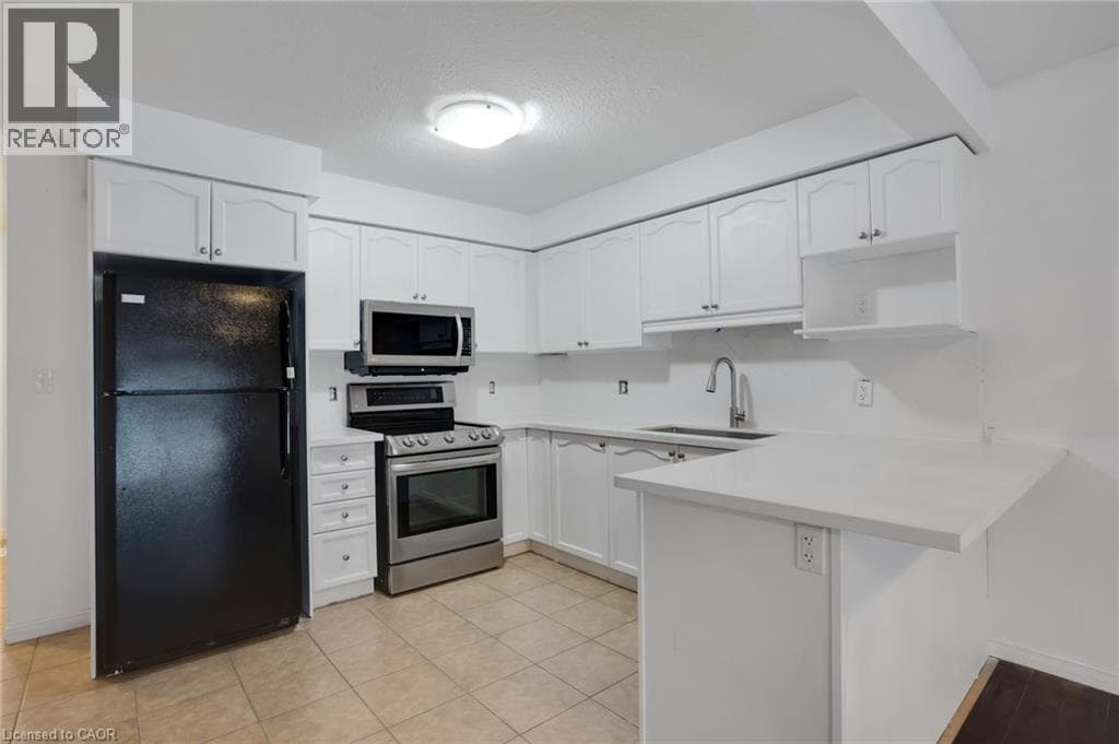 Townhouse for sale at 310 FALLOWFIELD Drive, Country Hills East, Kitchener, Ontario, photo 7