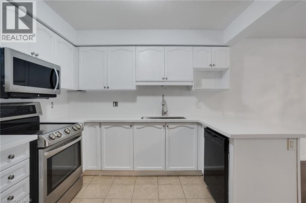 Townhouse for sale at 310 FALLOWFIELD Drive, Country Hills East, Kitchener, Ontario, photo 9