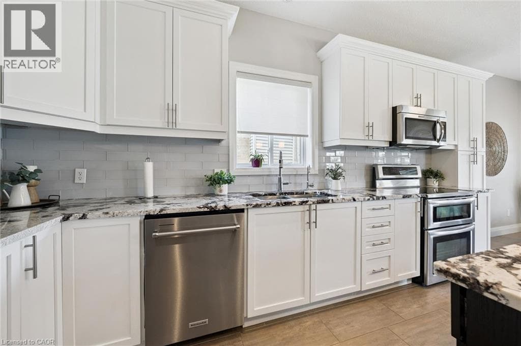 Detached for sale at 941 EDEN OAK Court, Grand River South, Kitchener, Ontario, photo 18