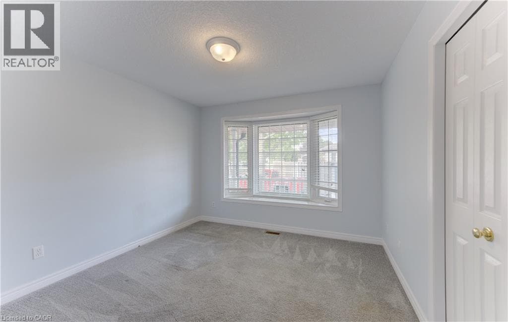 Townhouse for sale at 25 BANKSIDE Drive Unit# 2, Highland West, Kitchener, Ontario, photo 2
