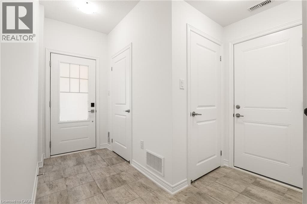Townhouse for sale at 10 BIRMINGHAM Drive Unit# 129, Industrial Park, Cambridge, Ontario, photo 4