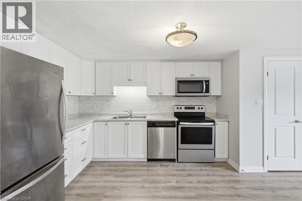 Townhouse for sale at 1989 OTTAWA Street S Unit# 17G, Laurentian West, Kitchener, Ontario, photo 19