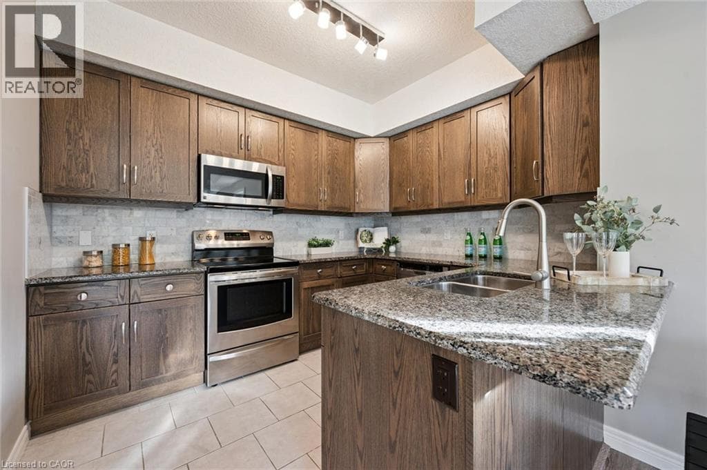 Townhouse for sale at 1114 FAIRWAY Road N Unit# B, Grand River South, Kitchener, Ontario, photo 9