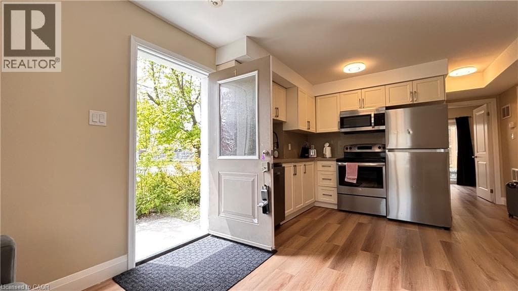 Townhouse for sale at 122 COURTLAND Avenue E Unit# 1, Mill Courtland Woodside Park, Kitchener, Ontario, photo 2
