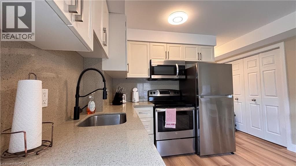 Townhouse for sale at 122 COURTLAND Avenue E Unit# 1, Mill Courtland Woodside Park, Kitchener, Ontario, photo 5