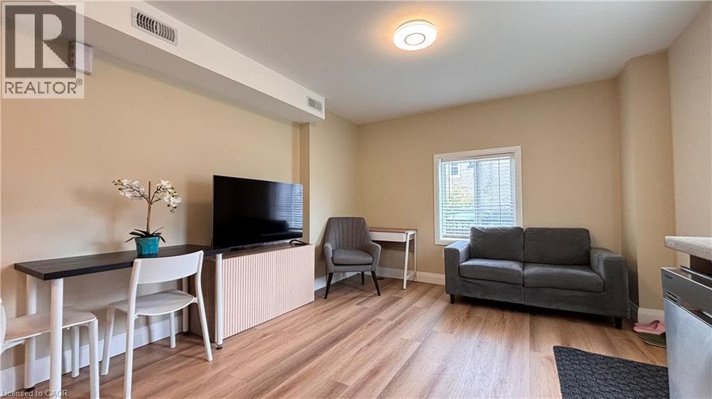 Townhouse for sale at 122 COURTLAND Avenue E Unit# 1, Mill Courtland Woodside Park, Kitchener, Ontario, photo 4